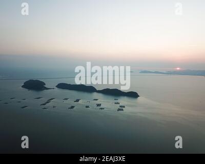 Aerial view Pulau Aman, Pulau Betong in sunset Stock Photo