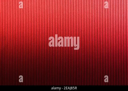 Decorative background red orange color, striped texture vertical gradient. Wallpaper Art. Design. Stock Photo