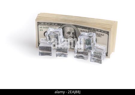 A bundle of billions of US dollars worth of ice cubes. The concept of asset freezing. Stock Photo
