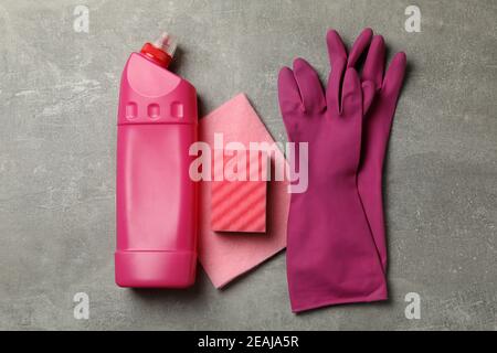 Cleaning tools on gray background, top view Stock Photo