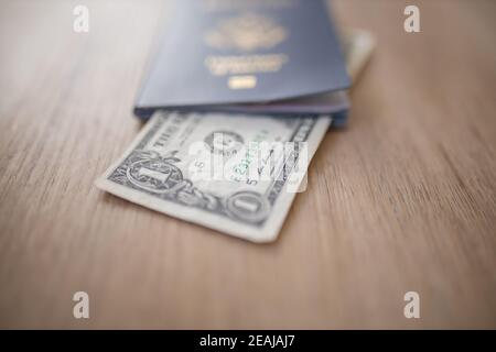 One-Dollar Bill Inside a United States of America Passport Stock Photo