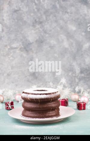 Traditional german christmas chocolate cake called Baumkuchen, winter season sweets Stock Photo