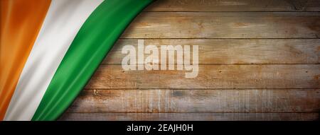 Ivorian flag on vintage wood wall banner Stock Photo