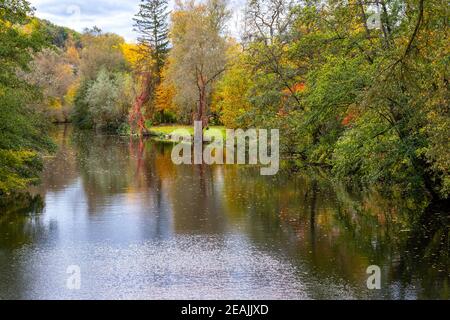 River Glan surrounded with multi colored trees Stock Photo