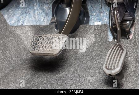 Car brake pedal and accelerator pedal Stock Photo - Alamy