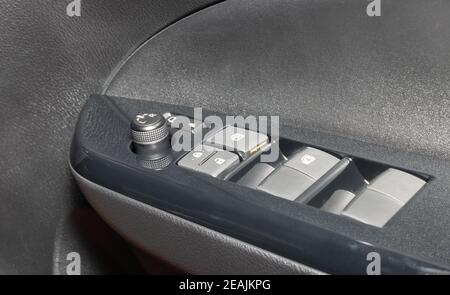 Side Mirror Control Switch of Car in Zoom View Stock Photo