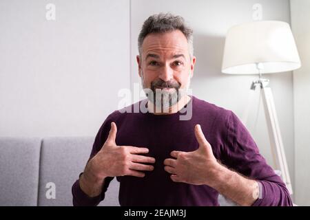 Senior Learning Sign Language Stock Photo