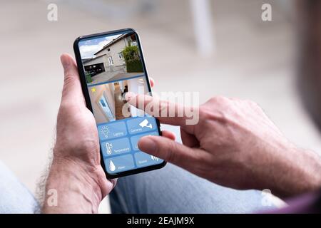 Smart Home CCTV Security On Mobile Phone Stock Photo