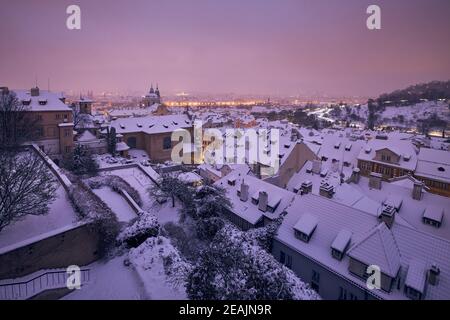 Snowy roofs of the Lesser town Prague in winter, Czech republic, Europe ...