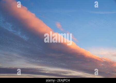 Sky with pastel-colored clouds Stock Photo