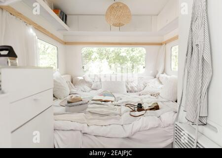 Camping in a trailer, rv bedroom interior, nobody Stock Photo
