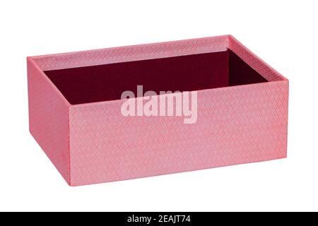 Gift box isolated. Close-up of a red opened present or gift box isolated on a white background. Birthday, valentine, anniversary or other holidays. Macro photograph. Stock Photo