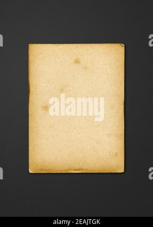Old parchment paper texture isolated on black Stock Photo