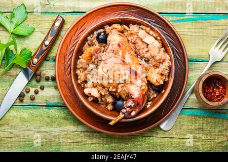 Delicious risotto with rabbit. Stock Photo