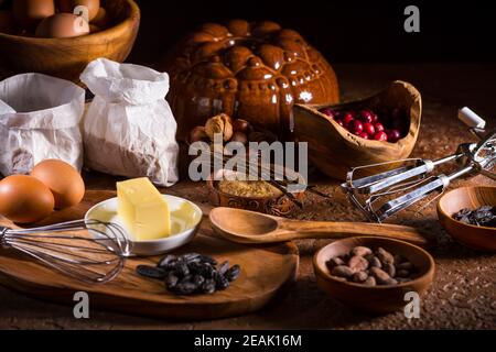Different baking ingredients, spices and kitchen utensils in vintage style Stock Photo