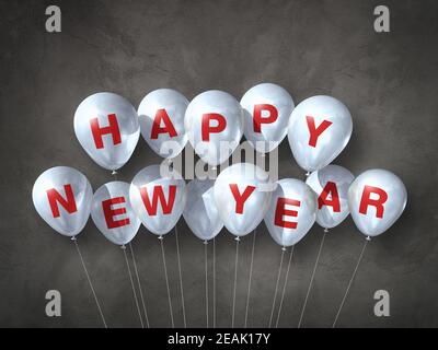 White happy new year air balloons on a dark concrete background Stock Photo