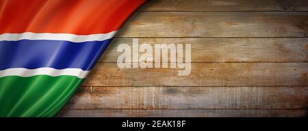 Gambian flag on vintage wood wall banner Stock Photo