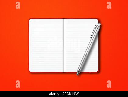 Red open notebook with a pen isolated on colorful background Stock Photo