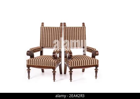 Pair of old fashioned wood chairs on the white background. Stock Photo