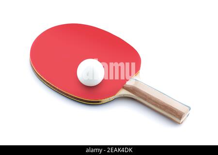Ping pong ball resting on a table tennis bat paddle on white Stock Photo