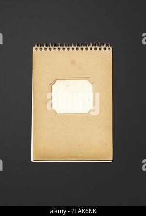 Vintage spiral close notebook on black background Stock Photo