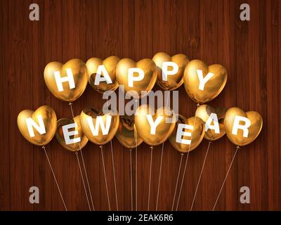 Gold happy new year heart shaped air balloons on a dark wooden background Stock Photo