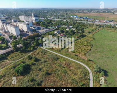 Top view of a silo elevator. Aerophotographing industrial object. Stock Photo