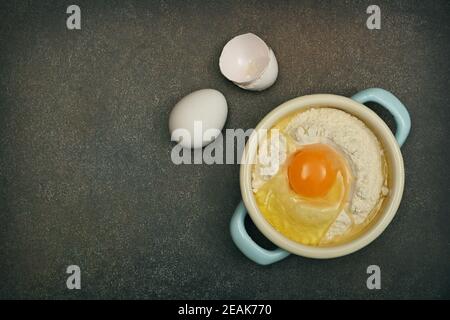 Flat lay of baking ingredients on table Stock Photo
