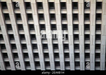 The regular windows pattern in a concrete building Stock Photo
