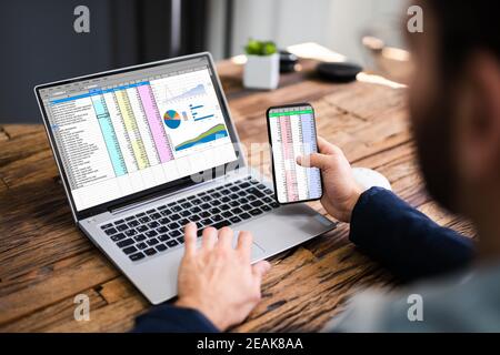 Analyst Employee Using Spreadsheet Stock Photo