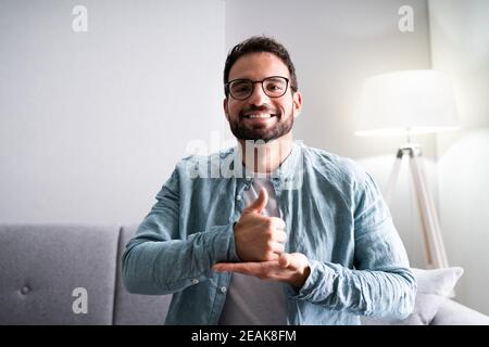 Adult Learning Sign Language Stock Photo