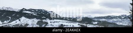 Panoramic view of the Alps in winter in Sonthofen, Allgäu, Germany Stock Photo