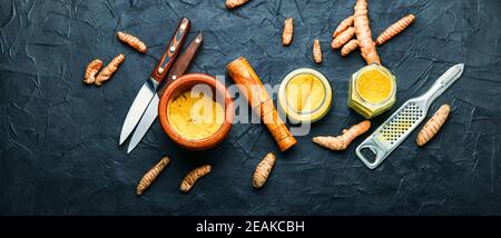 Turmeric powder and fresh turmeric Stock Photo