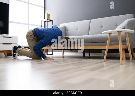 Lost Something. Looking For Wallet Stock Photo