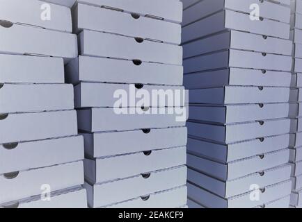 Pizza Boxes in Stacks Stock Photo