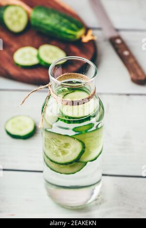 Infusion with sliced cucumber in bottle Stock Photo