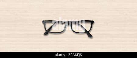 Black glasses isolated on white wooden banner Stock Photo