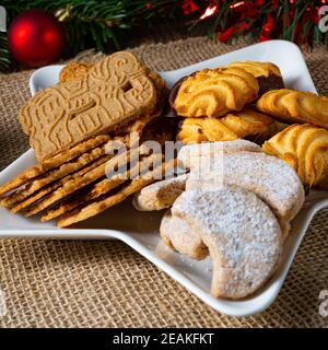Different types of biscuits with rustic Christmas decorations Stock Photo