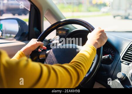 woman while driving the car Stock Photo