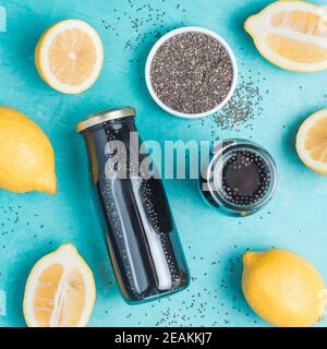 Detox activated charcoal black chia lemon water Stock Photo