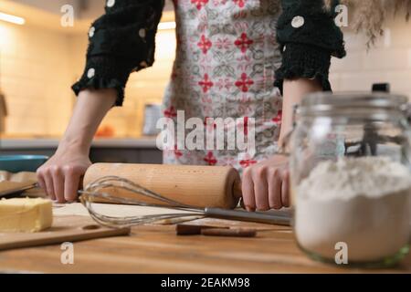 Women preparing homemade food pie, pizza, pasta with a dough roll. Hobbies and family life concept Stock Photo