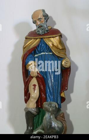 Saint Roch, statue on the main altar in the All Saints Church in the Bedenica, Croatia Stock Photo