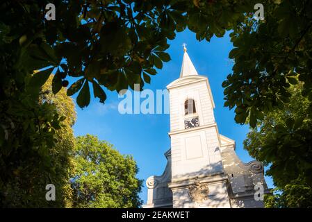 white belltower of a church in Burgenland Stock Photo