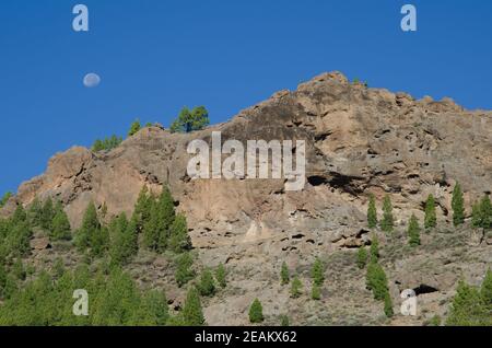 Cliff and moon in The Nublo Natural Monument. Stock Photo