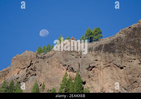 Cliff and moon in The Nublo Natural Monument. Stock Photo