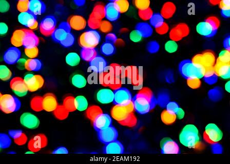Blurred christmas multi color LED lights. Stock Photo
