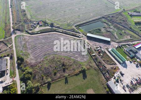 Top view of the village. One can see the roofs of the houses and gardens. Road in the village. Village bird's-eye view Stock Photo