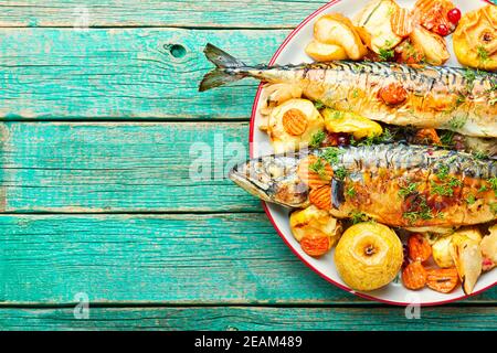 Baked fish with apple. Stock Photo