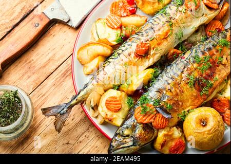 Baked fish with apple. Stock Photo
