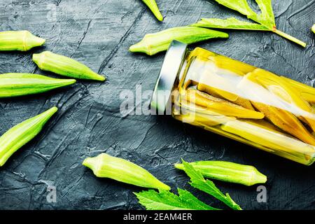 Canned okra in jars Stock Photo